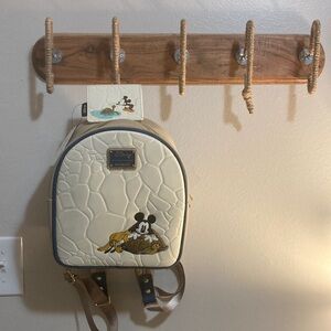 Loungefly Disney Mickey and turtle backpack and wallet.